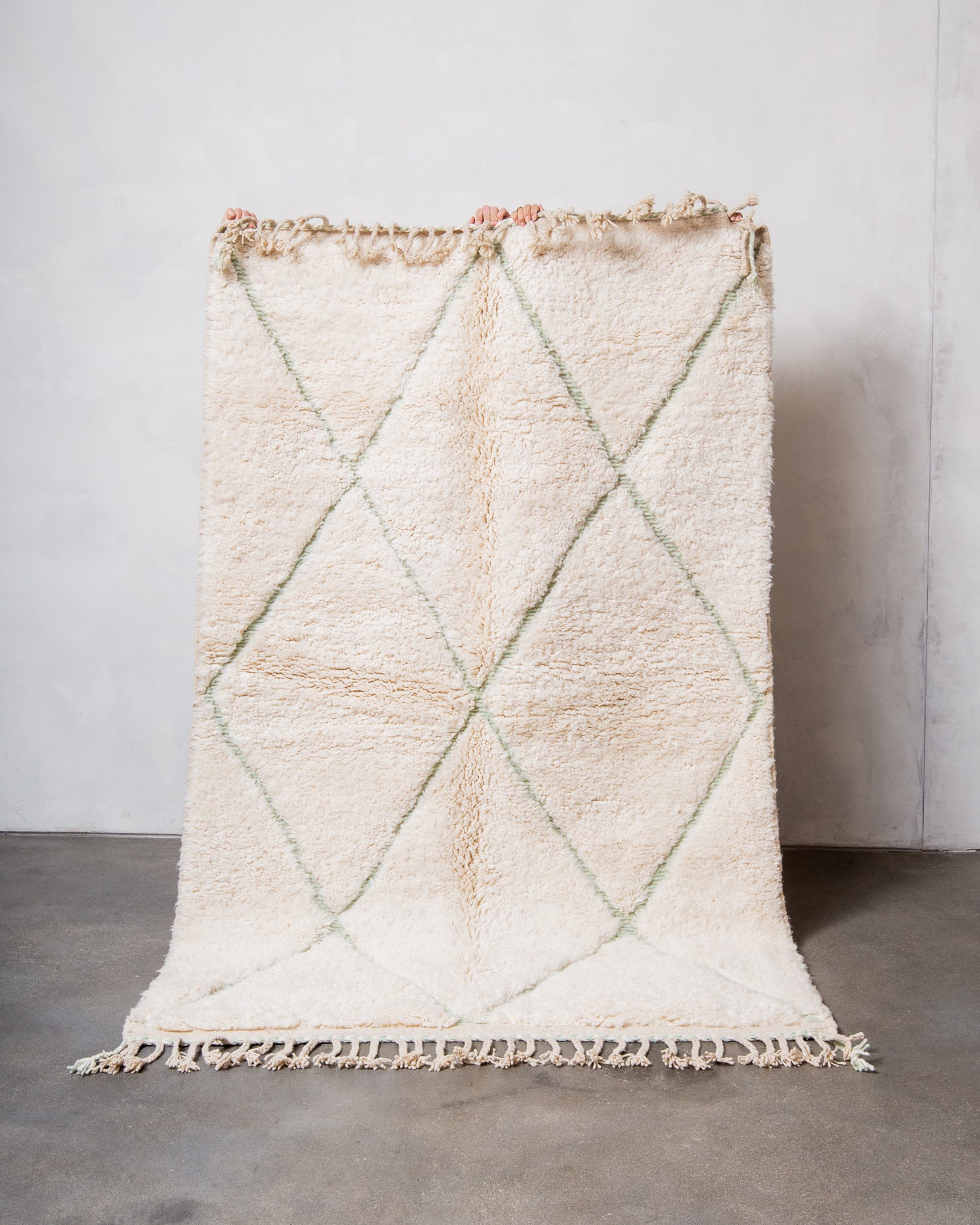 Modern, designer, handcrafted Berber rug from Morocco. Beniourain carpet with beautiful colours and patterns and fluffy wool texture.